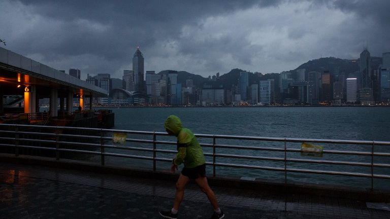Typhoon kills 12, destroys rice fields in Philippines, takes aim at Hong Kong